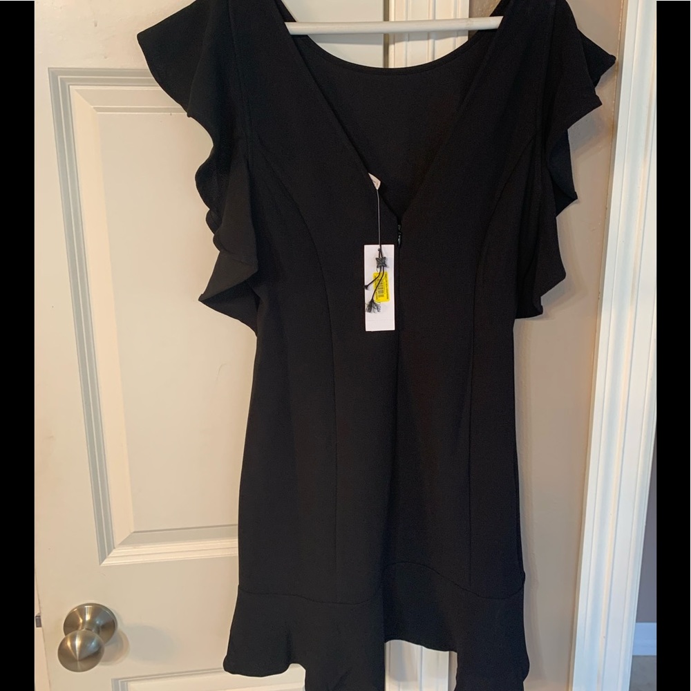 Black cocktail dress. Never worn.
